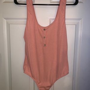 Body suit, very fitted on medium to larges